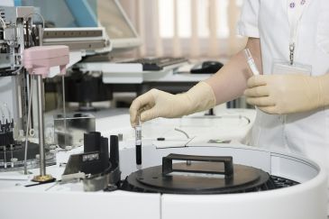 Image of hands in a lab